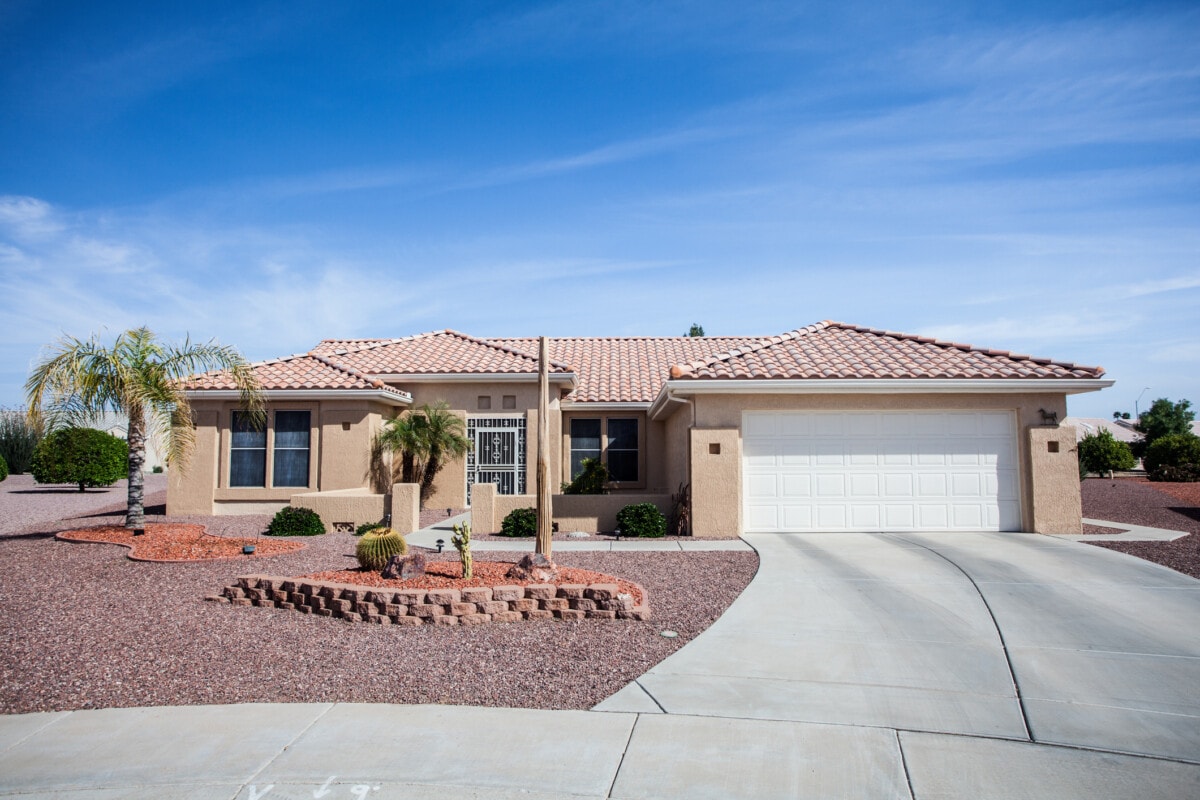 A desert house embodies the increasing risk and considerations for homeowners insurance in wildfire-prone areas.