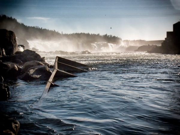 Willamette Falls, showcasing its natural majesty and hinting at its deep historical roots.